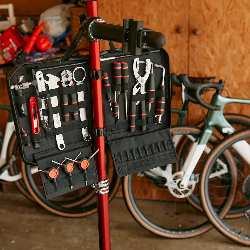 16415-Feedback-Sports-Ultralight-Bike-Repair-Stand-with-team-edition-Lifestyle_df67989e-8299-4cc6-a8ae-4e47c62348c8_2048x2048.webp